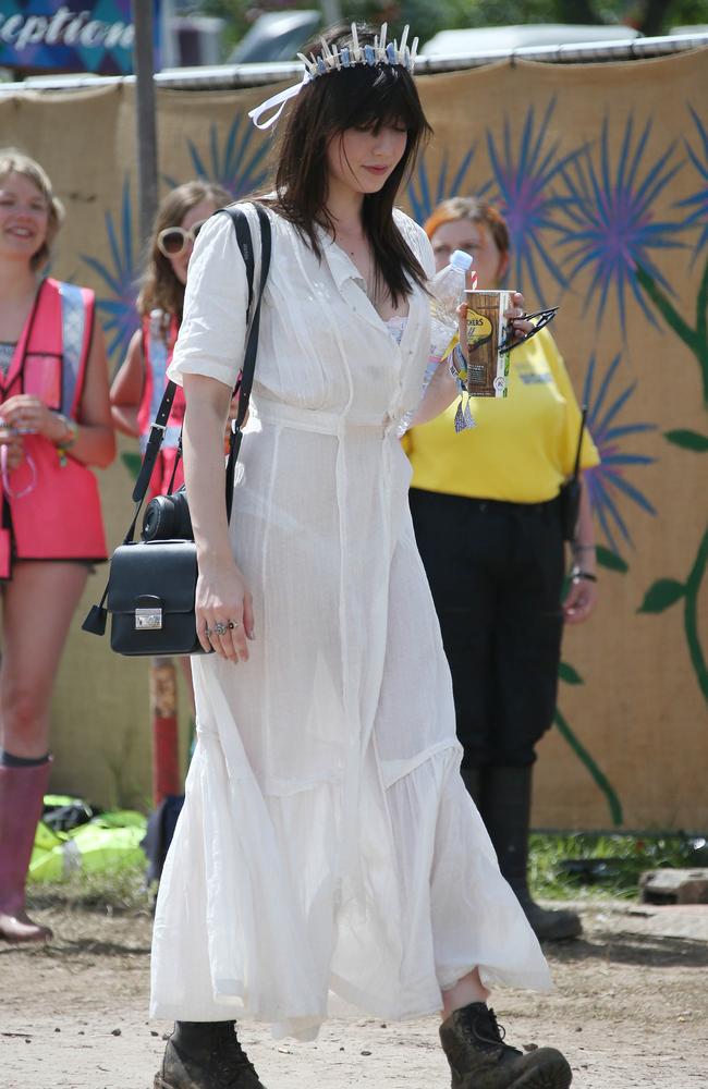 Model Daisy Lowe walks backstage during the 2015 Glastonbury Music Festival. Picture: AAP