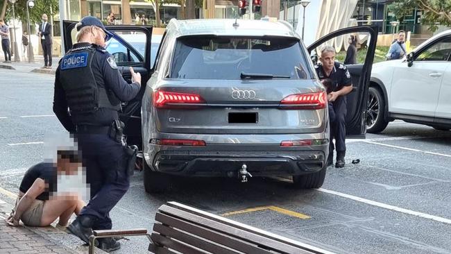 The smashed driver’s side window is clearly visible, at the scene on the corner of George and Turbot streets in the CBD’s legal precinct.