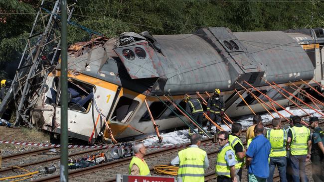 Safety first: Earlier this month, a train carrying around 60 passengers travelling from Spain to Portugal derailed, killing and injuring people. Picture: Lalo R. Villar/AP