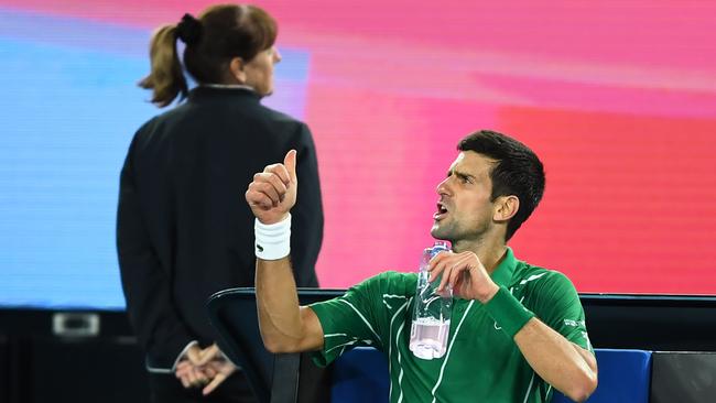 Novak Djokovic abuses the chair umpire during the Australian Open final. Picture: Saeed Khan/AFP