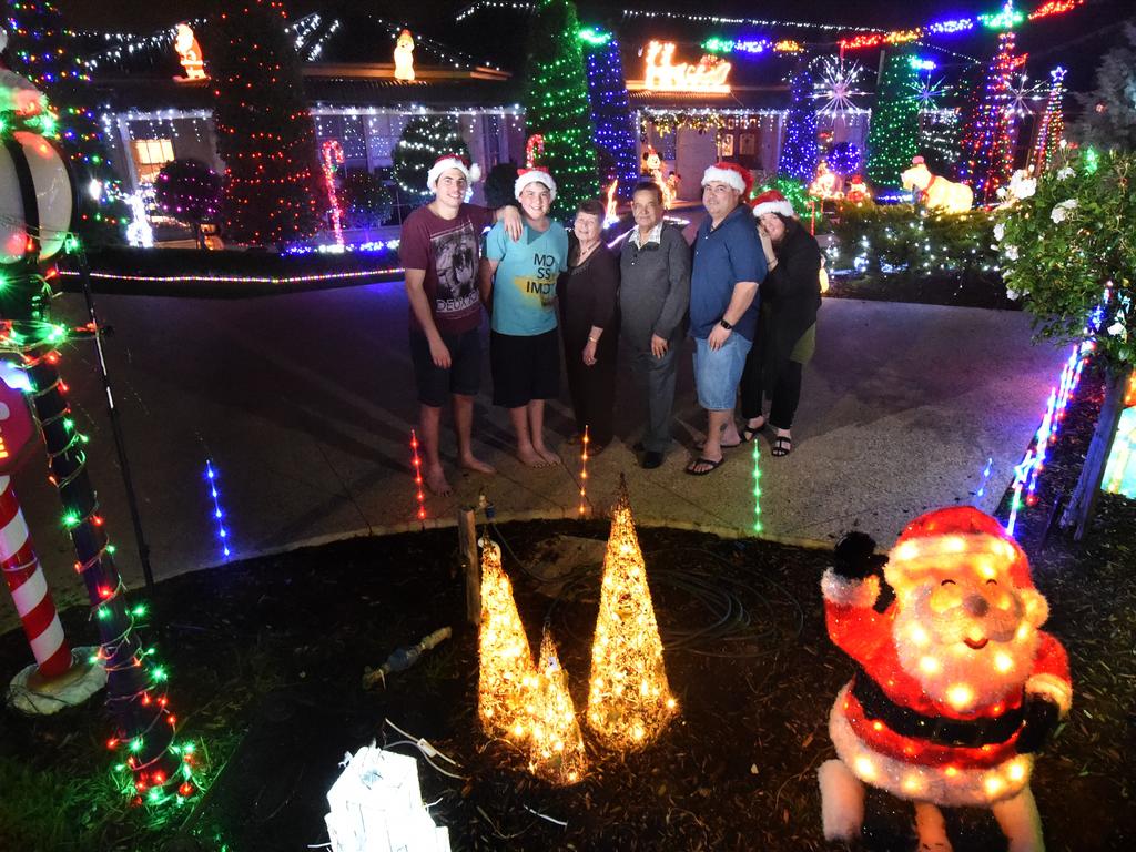 The Cachia family and their Christmas lighst in Rainone Place, Tarneit. Luke, 20, Zac, 15, Irene, George (Grandparents), Ed and Nicole in their front yard. Picture: Tony Gough