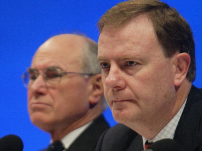 Aust politician Peter Costello (r) with Prime Minister John Howard during Liberal Party Federal Convention Breakfast at Adelaide Convention Centre 07 Jun 2003.