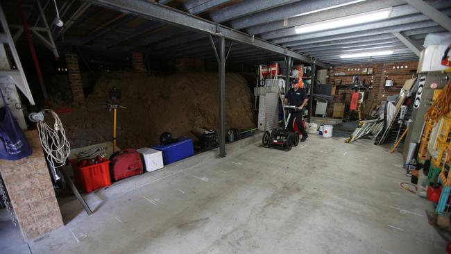 Police use a ground penetrating radar on the cement floor of the garage of William Tyrrell's foster grandmother’s home in Kendall. Picture: Supplied