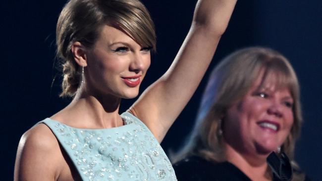 ARLINGTON, TX - APRIL 19: Honoree Taylor Swift accepts the Milestone Award onstage during the 50th Academy Of Country Music Awards at AT&T Stadium on April 19, 2015 in Arlington, Texas. (Photo by Cooper Neill/Getty Images for dcp)