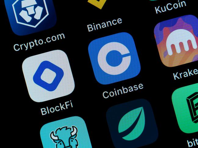 15 June 2022, Baden-Wuerttemberg, Rottweil: The application apps of cryptocurrency exchanges Crypto.com, Binance, KuCoin, BlockFi, Coinbase, Kraken, Bison, Bitfinex and Bitpanda are seen on the display of an iPhone SE. Employees are being laid off at numerous cryptocurrency firms. Photo: Silas Stein/ (Photo by Silas Stein/picture alliance via Getty Images)