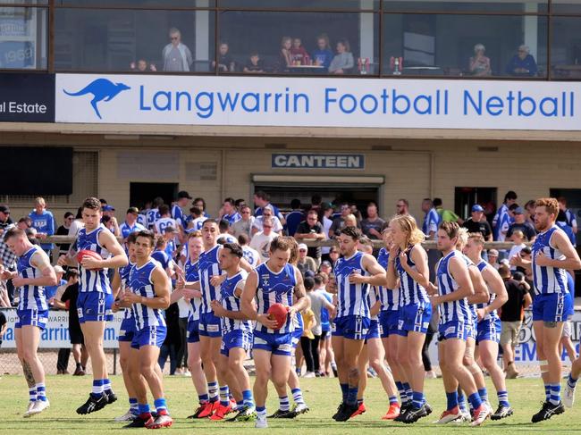 Langwarrin players warm up before facing Chelsea on Saturday. Pic: Paul Churcher.