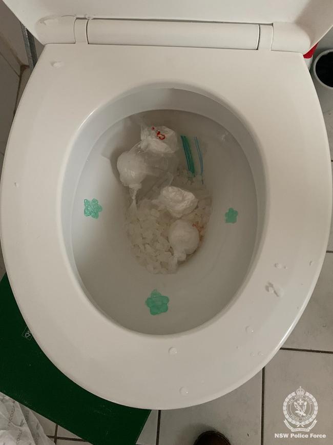 On Wednesday, one suspect was busted and allegedly caught flushing 750 grams of methylamphetamine and 90 grams of heroin down the toilet at Liverpool. Picture supplied by NSW Police