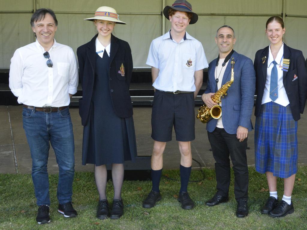 Queensland Symphony Orchestra chief conductor Umberto Clerici and saxophonist Nick Russoniello met with three Toowoomba students selected to play alongside the Orchestra at Friday's show. Photo: Jessica Klein