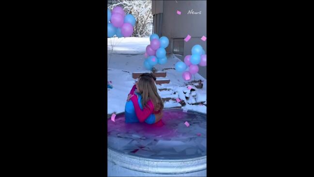 Couple's wild ice bath gender reveal