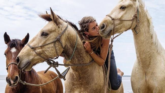 Alienor le Gouvello with her three rescued brumbies. Picture: Cat Vinton