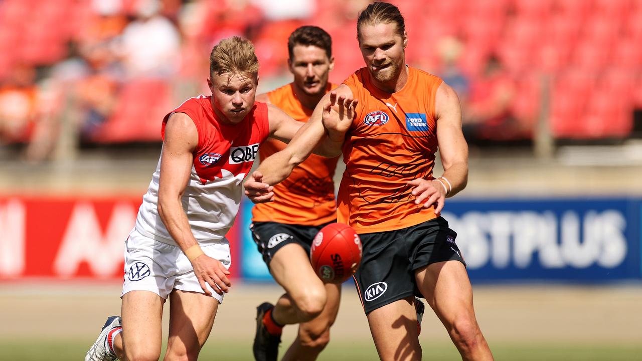 Young Swan Braeden Campbell battles with Harry Himmelberg.