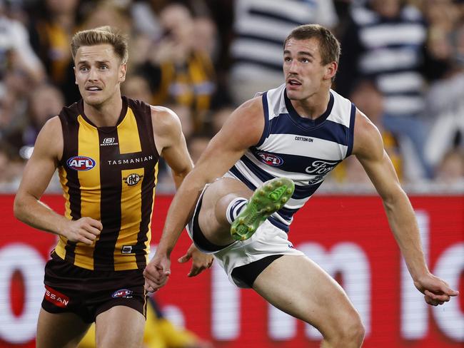 Ted Clohesy gets a kick away against the Hawks. Picture: Michael Klein