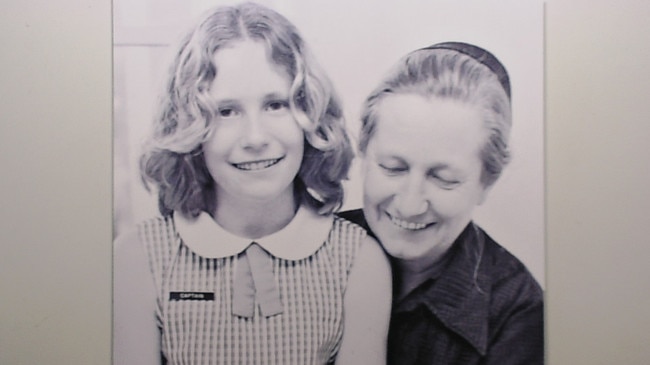 Royse Rowe Davies was given a bravery award after he helped rescue crew from the Lake Illawarra after it crashed into the Tasman Bridge on January 5, 1975. Pictured is his wife Joyce and daughter Joanne viewing a telegram telling him of his award.