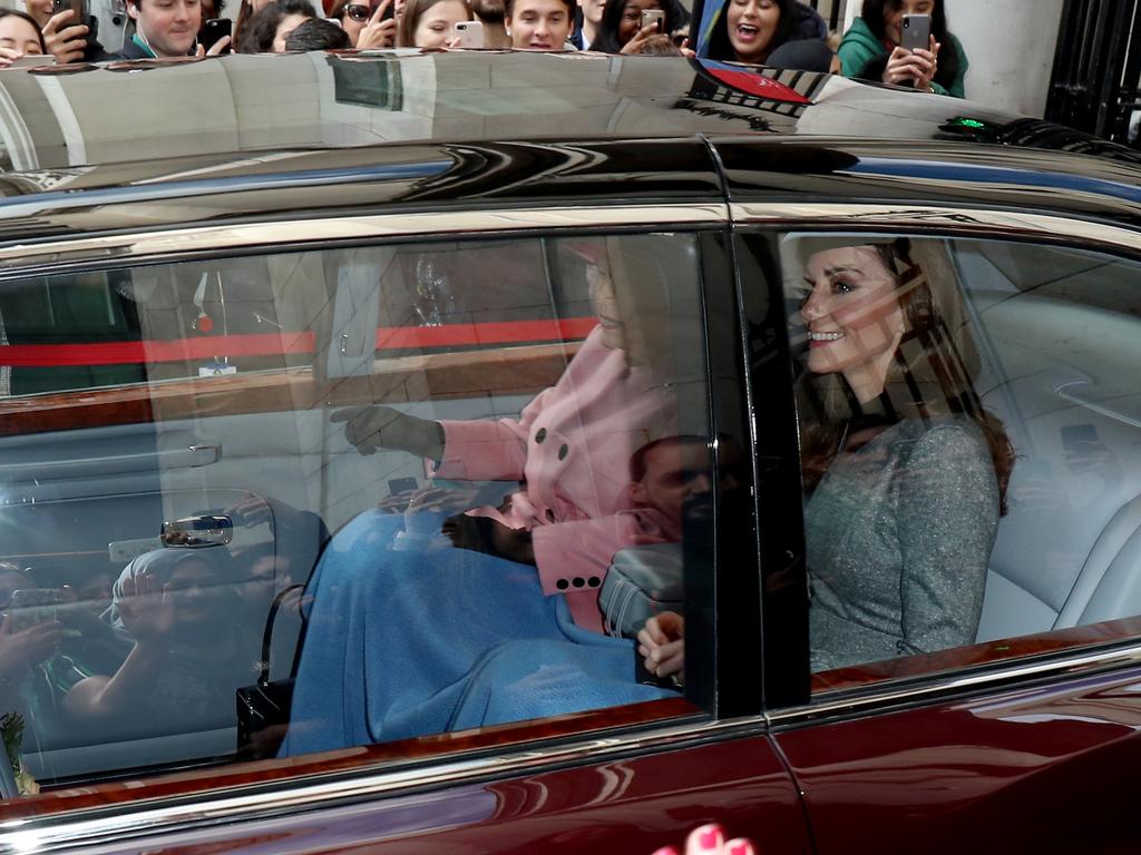 The Queen and Kate sharing a nanna knee rug in the back of her Bentley. Picture: Neil Mockford/GC Images