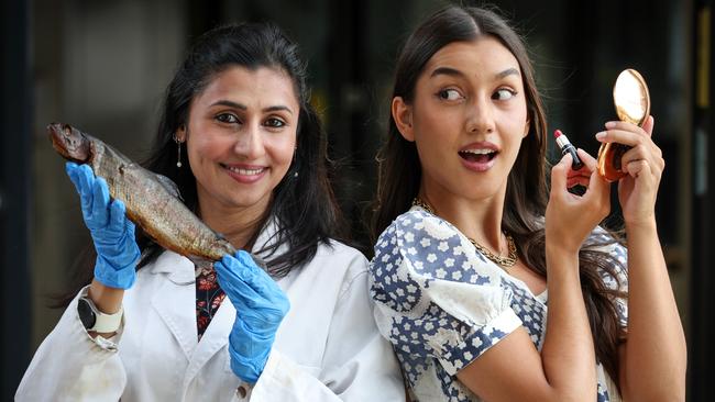 Future Victoria - Fish Cosmetics. Researchers are using fish guts, scales etc to develop cosmetics and collagen. Swinburne University Academic Director and Team Leader for Smart Materials Nisa Salim with the fish product and Jasmine Ng using the finished product.                                                               Picture: David Caird