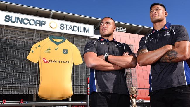 Caleb Timu, left, and Israel Folau at Suncorp Stadium yesterday. Picture: AAP