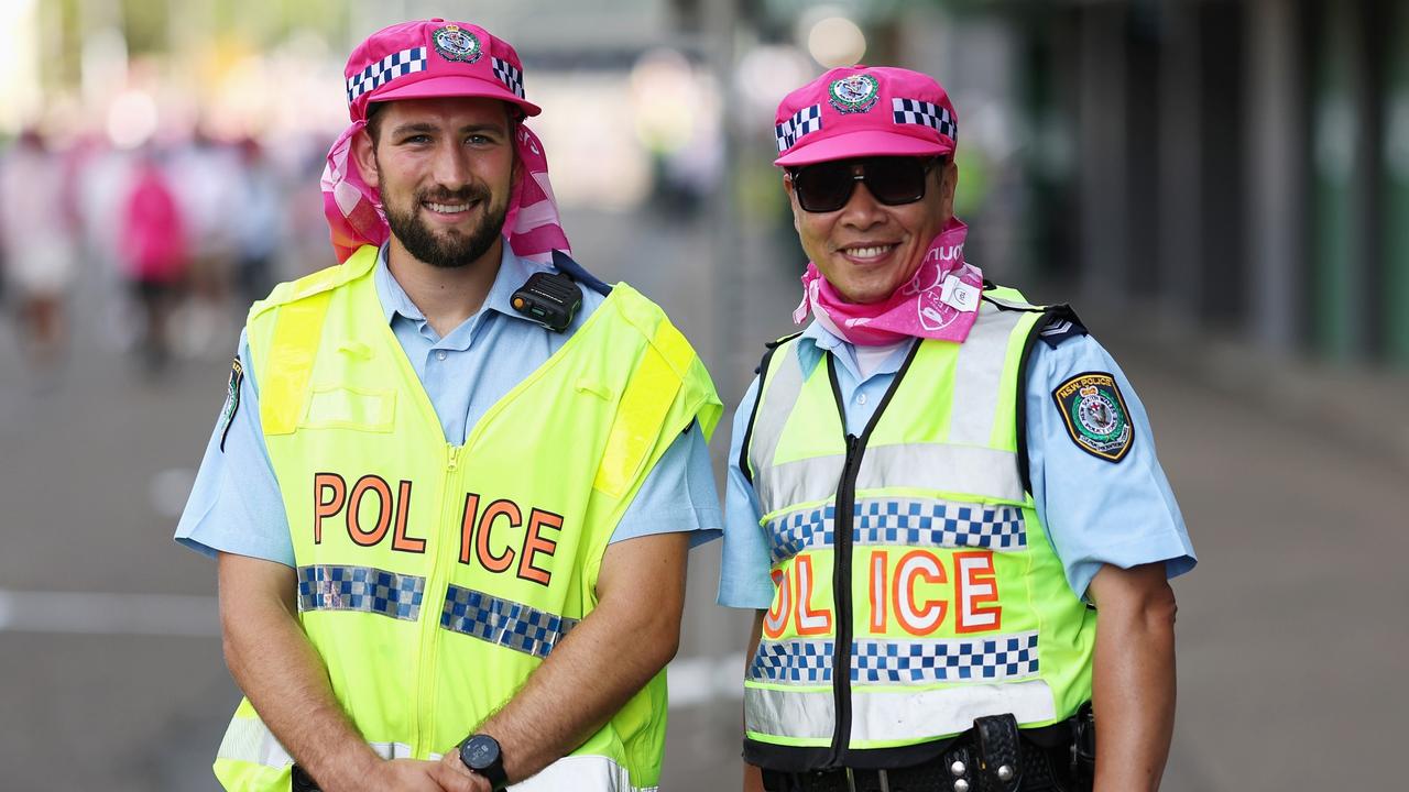 Police officers pose wearing pink during Jane McGrath Day ahead of play during day three of the Fifth Men's Test Match in the series between Australia and India. Picture: Getty Images