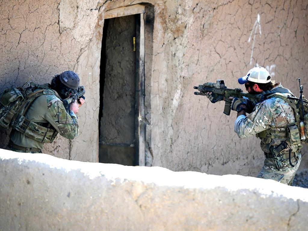 Special Operations Task Group soldiers conduct clearance drills at a training facility at the Multi National Base – Tarin Kowt. Picture: Department of Defence