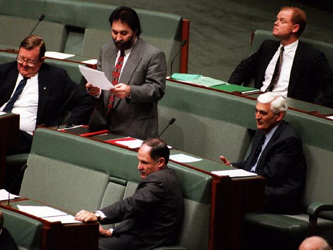 Mr Mack (lower right) with fellow independents in parliament Paul Filing (right rear) and Phil Cleary (standing).