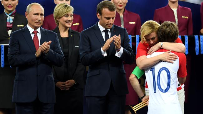 Croatia President Grabar Kitarovic greets Luka Modric as he is presented with his runner-up medal. Photo: Getty Images