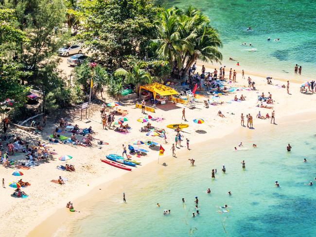 Top view of small isolated tropical island with white sandy beach and blue transparent water and coral reefs in phuket at thailand, Aerial shootingCredit: iStockescape18 july 2021editors letter