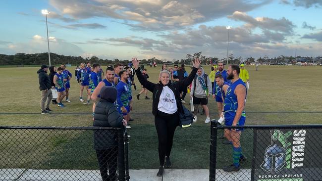 Job done: Berwick Springs trainer Sarah leads the Titans’ celebrations. Picture Valeriu Campan