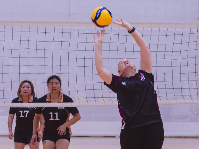 Action as Hard CorÃ“t V Haikyu in the Pan Pacific Masters Games Volleyball tournament. Picture: Glenn Campbell