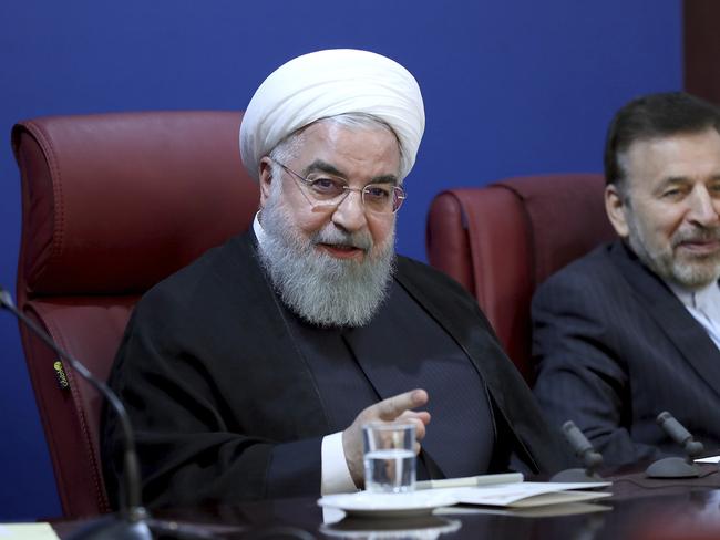 In this photo released by official website of the office of the Iranian Presidency, President Hassan Rouhani speaks in a meeting with finance ministry officials in Tehran, Iran, Monday, Nov. 5, 2018. Iran greeted the re-imposition of U.S. sanctions on Monday with air defense drills and an acknowledgement from President Hassan Rouhani the nation faces a 