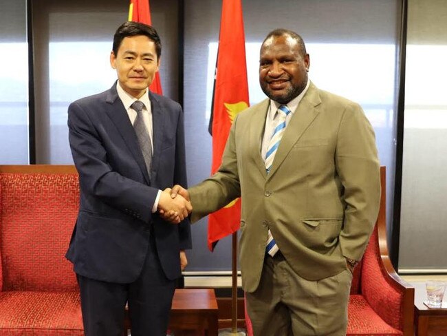 Chinese Ambassador to PNG Xue Bing (left) and PNG Prime Minister James Marape (right) pictured in 2019. Picture: Supplied