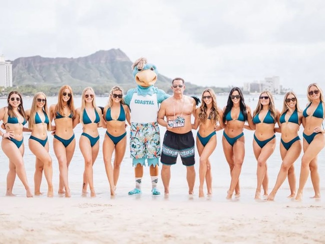 Coastal Carolina University football coach Tim Beck has addressed a since-deleted photo that showed him posing shirtless alongside the school’s bikini-clad dance team. Pic: X