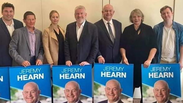 Liberal candidate Jeremy Hearn (third from right) with Communications Minister Mitch Field.