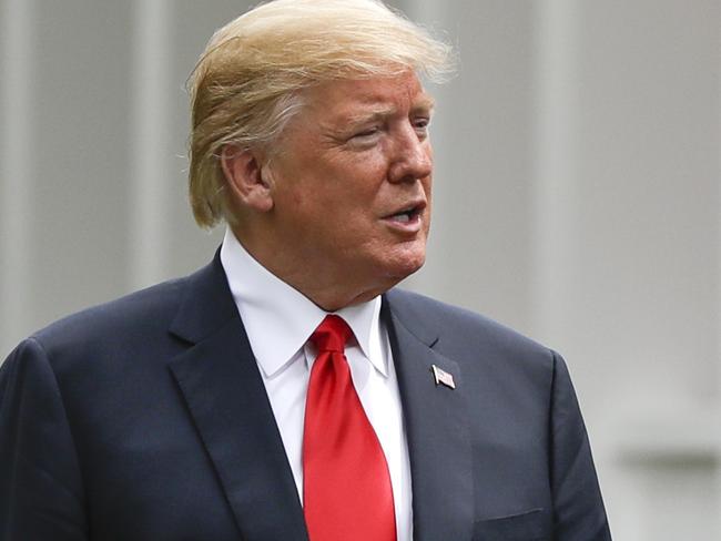 FILE - In this June 12, 2018, file photo, U.S. President Donald Trump, left, and North Korea leader Kim Jong Un walk from their lunch at the Capella resort on Sentosa Island in Singapore. The most sensational of Kim's trip was the summit in Singapore with Trump. (AP Photo/Evan Vucci, File)