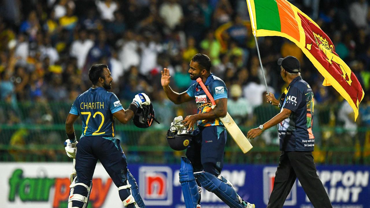 Sri Lanka's Charith Asalanka and Chamika Karunaratne celebrate their tyeam’s win. Picture: Ishara S. Kodikara / AFP