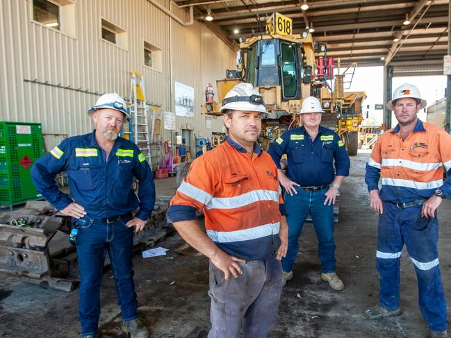 Workers at Acland Coal Mine. Preparing plant and equipment to commence operations. (LtoR) Mark Van Dongen; John Venz; Andy Scouller;