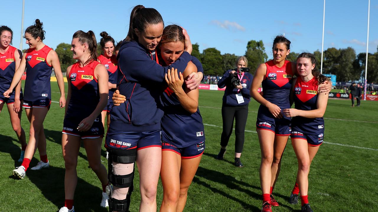 Daisy Pearce after injuring her knee in Round 9. Harford says it is not the sport which is the source of the problem.