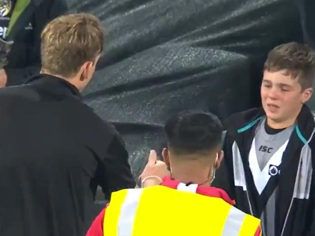 Tom Lynch consoled the Port Adelaide fan on the boundary.