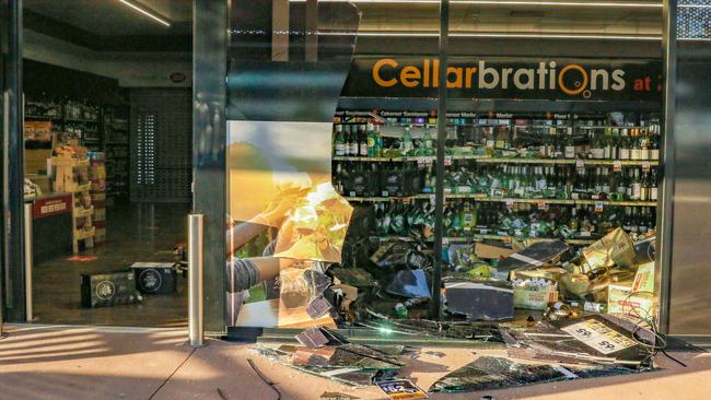 The aftermath of a ram raid on Cellarbrations in Zuccoli. Picture: Glenn Campbell