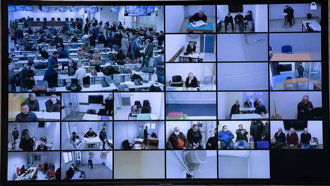 A view shows one of multiple televisions screens set up in a special courtroom on prior to the opening of the 'Rinascita-Scott' maxi-trial, in which more than 350 alleged members of Calabria's 'Ndrangheta mafia group and their associates go on trial in Lamezia Terme, Calabria. Picture: AFP