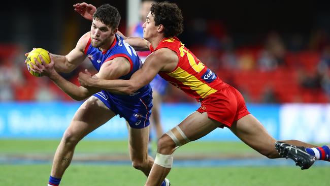 The pair were sat in a “biosecurity restricted area” of the stadium near the tunnel used by Suns and Western Bulldogs players to enter and exit the field. (Photo by Chris Hyde/AFL Photos/via Getty Images)