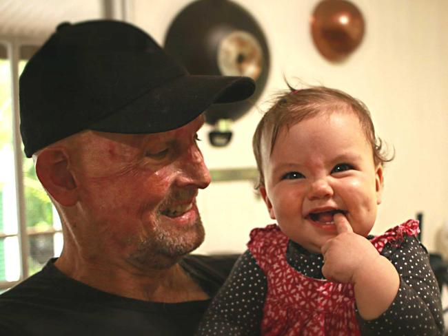 Matt Golinski with his daughter, Aluna.