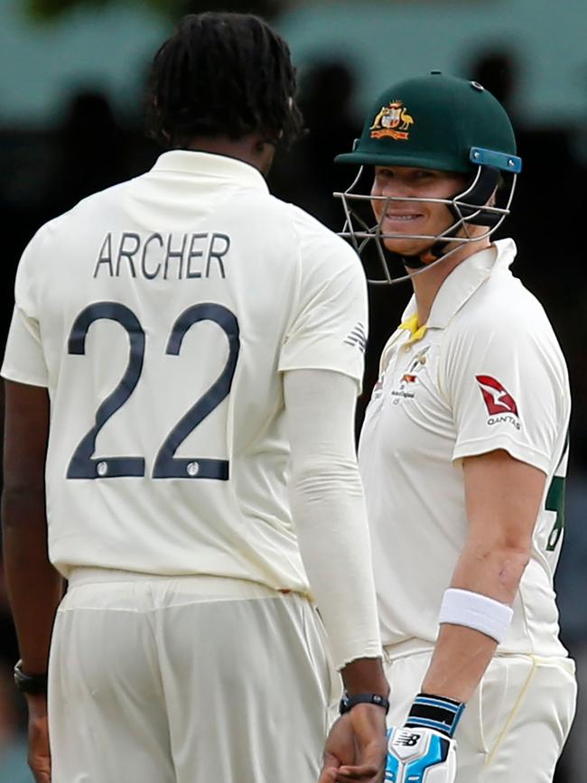 Australia's Steve Smith and England’s Jofra Archer. Picture: AFP