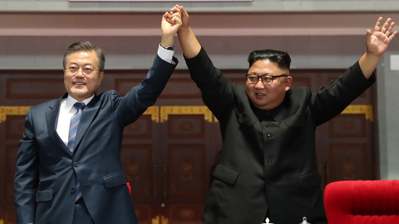 North Korean leader Kim Jong Un (R) and South Korean President Moon Jae-in. (Photo by Pyeongyang Press Corps/Pool/Getty Images)