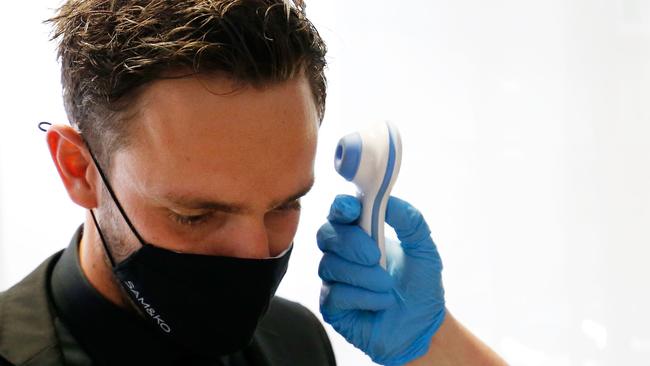 Jack Gunston has his temperature checked before the Brownlow event at NEP Studios, Southbank. Picture: Getty