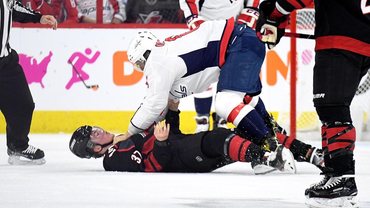 Capitals' Dowd takes Andrei Svechnikov's stick, throws it into crowd