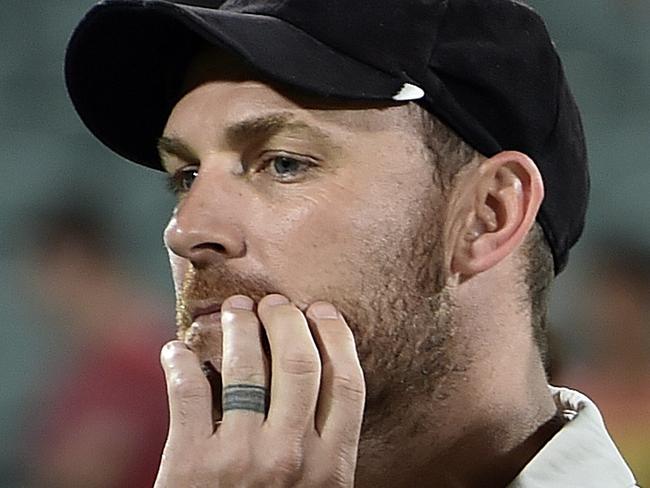 New Zealand's captain Brendon McCullum looks on at the end of the first day-night cricket Test match at the Adelaide Oval on November 29, 2015. AFP PHOTO / SAEED KHAN IMAGE RESTRICTED TO EDITORIAL USE - NO COMMERCIAL USE