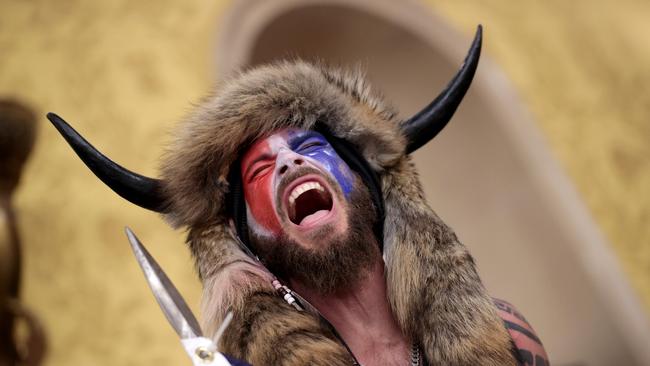 The so-called Q-Anon Shaman cries freedom during the January 6 riots. Picture: Getty Images