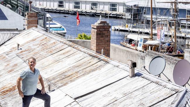 Brendan Bourke on the Telegraph Hotel’s roof, which will be demolished to make way for a rooftop bar. Picture: Eddie Safarik