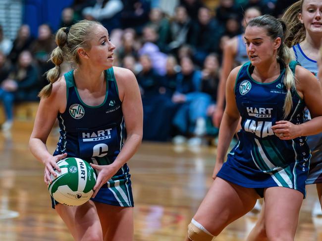 Lucy Bosker of Kingston Blues looks to pass the ball in the Tasmanian Netball League Semi Final. Saturday 6th July 2024. Cripps Waratah vs Kingston Blues.Picture: Linda Higginson.