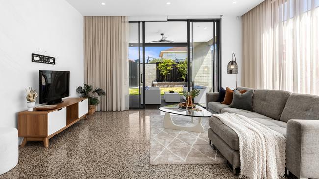 Polished concrete and soaring ceilings steal the show.