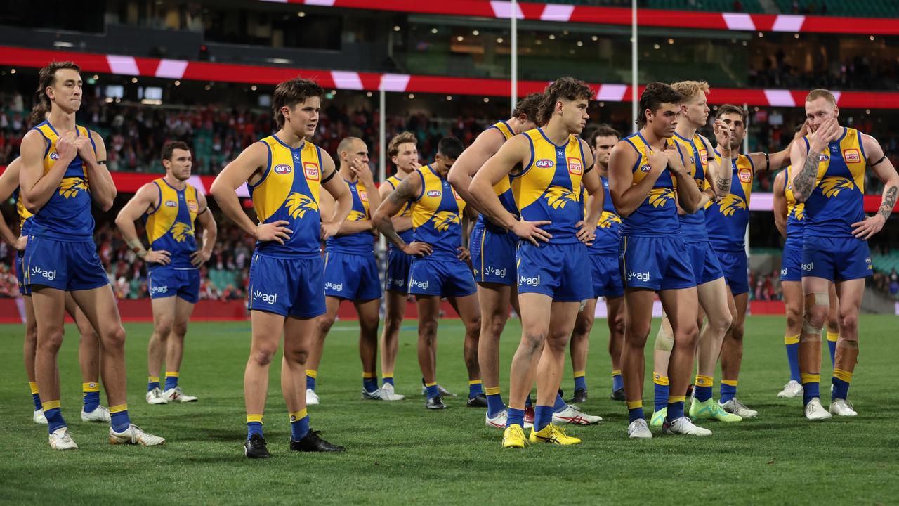 Eagles players look dejected after losing to Sydney. Picture: Mark Metcalfe/AFL Photos/via Getty Images